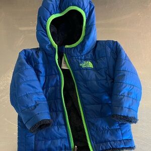 The North Face Blue Jacket with Neon Green Accents